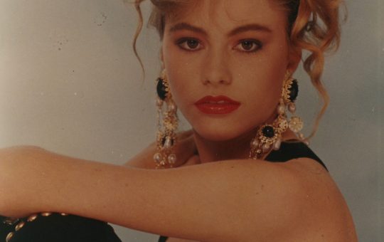 Young Sofia Vergara gold earings